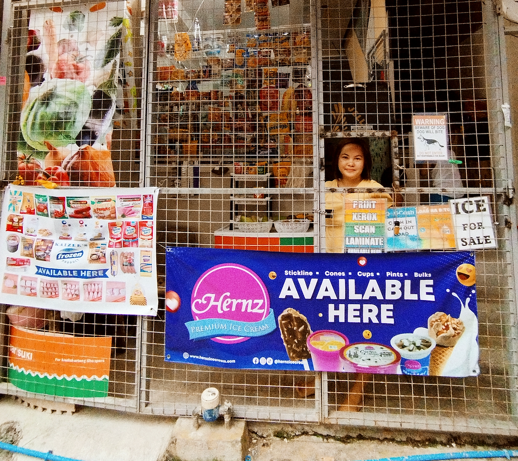 A picture of Jean Basco at her store in Manila