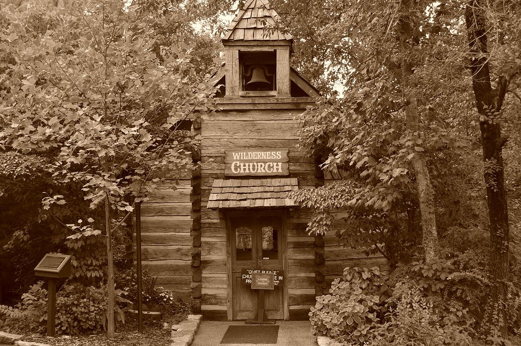 A photo of a wooden church in Ozark