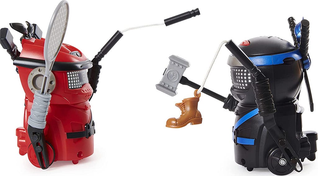 A red bot fighting a black bot with little items