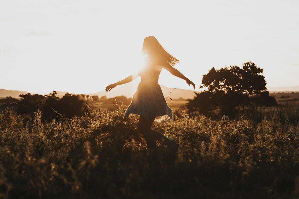 Woman dancing on the field