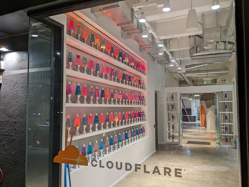 A wall of lava lamps in a corporate office