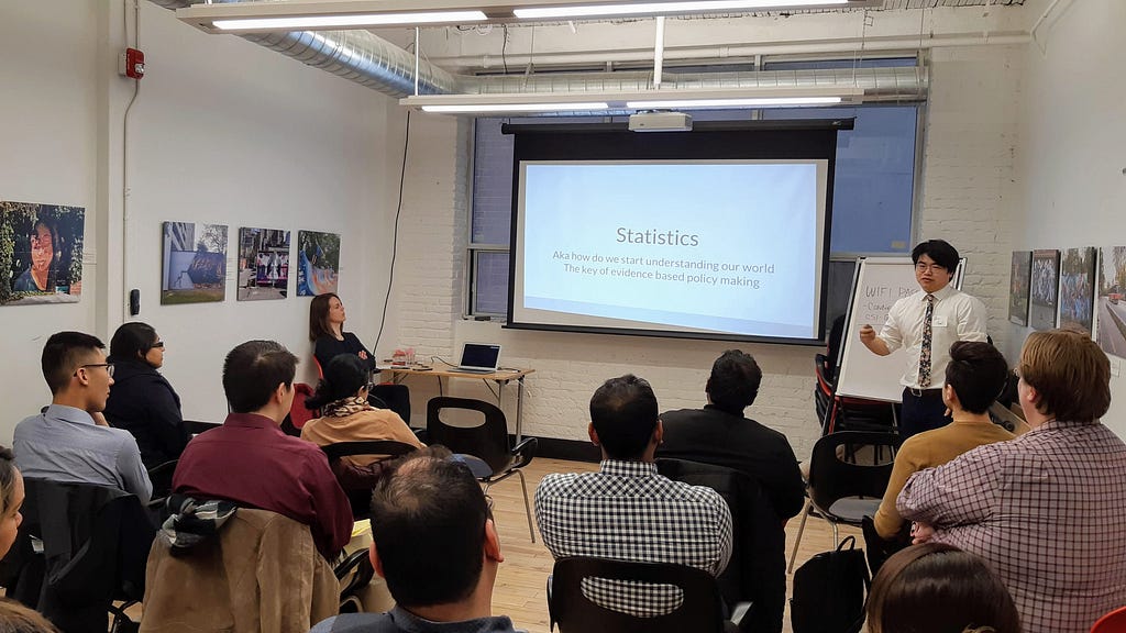 Alex Chen speaking at our Data 101 coffee hour in March.