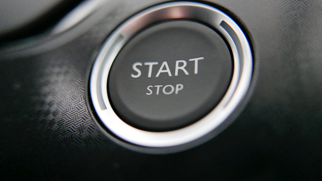 Close up of a start stop button on an automobile
