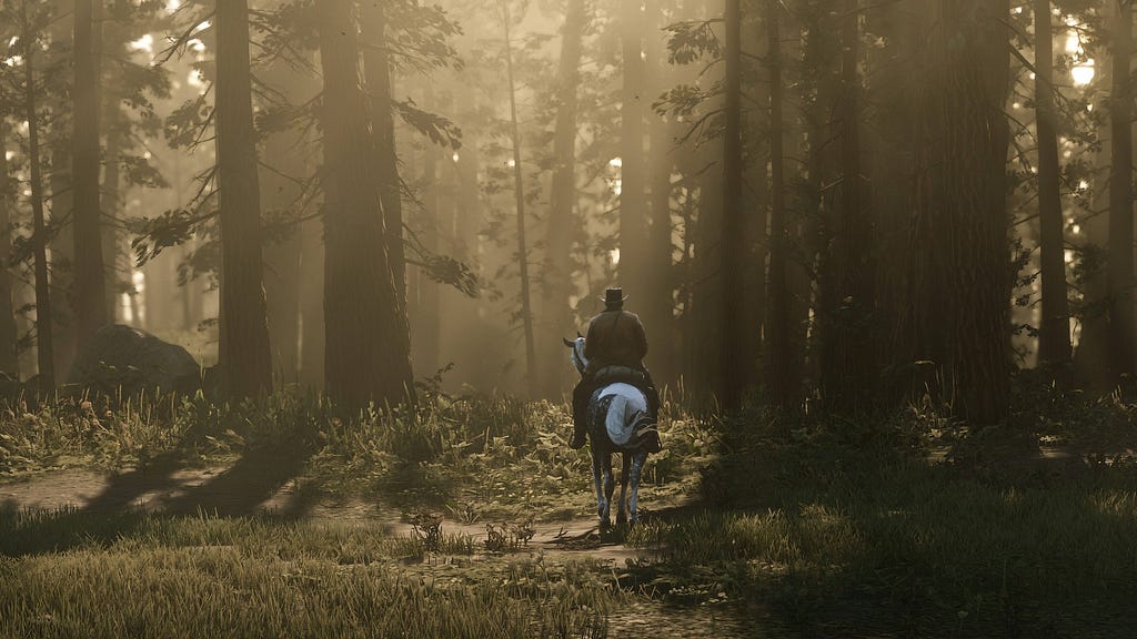 A lone horseman riding through a forest