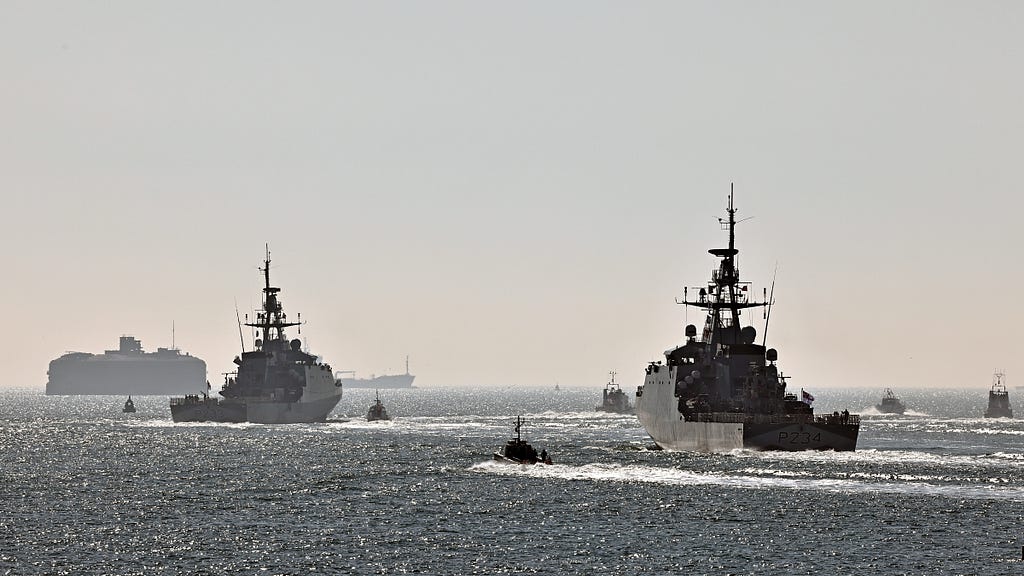 From left to right: HMS Tamar and HMS Spey.
