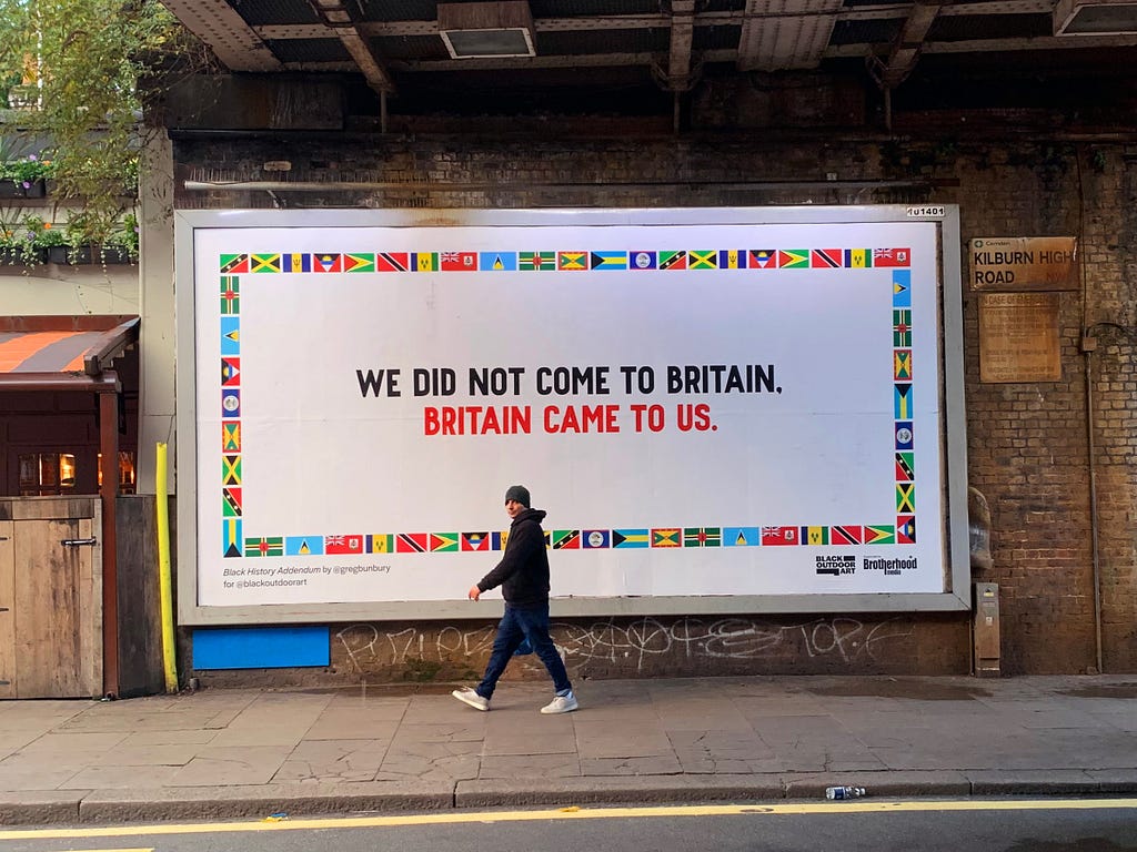 Kilburn, London, October 2022 — a billboard of the artwork ‘Black History Addendum’, created by Greg Bunbury. Photo credit: Greg Bunbury
