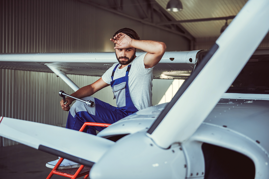 Photo of a sleepy mechanic.