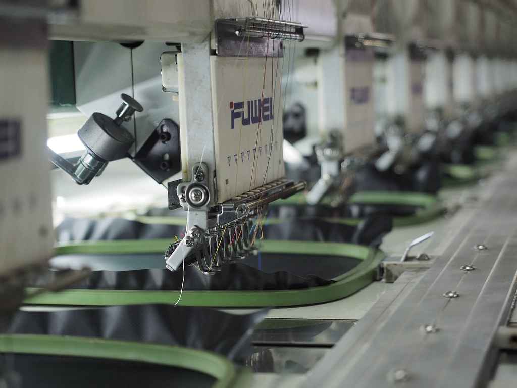 A picture of sewing machine manufacturing line.