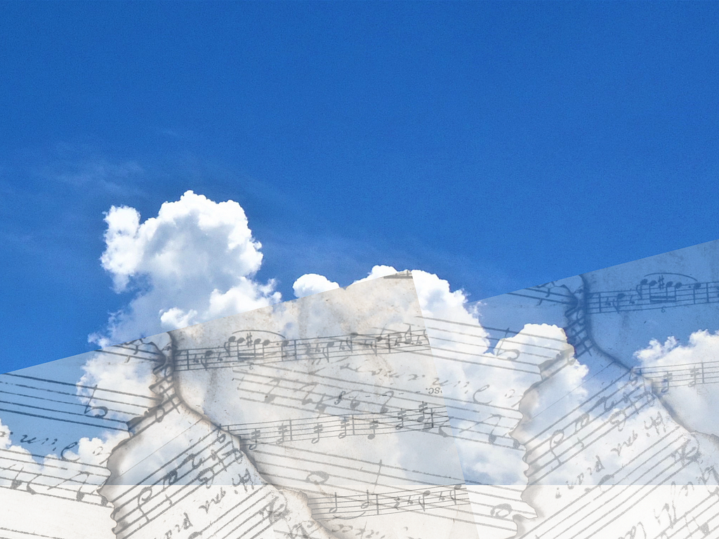 faint music notation over white cumulus clouds, blue sky backdrop