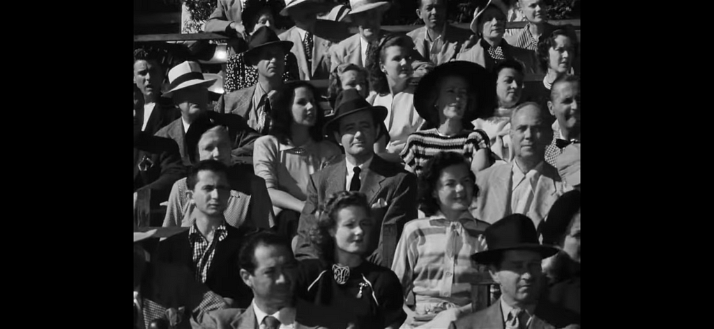 Bruno in the stands as a magnet for viewers’ eyes in “Strangers on a Train”