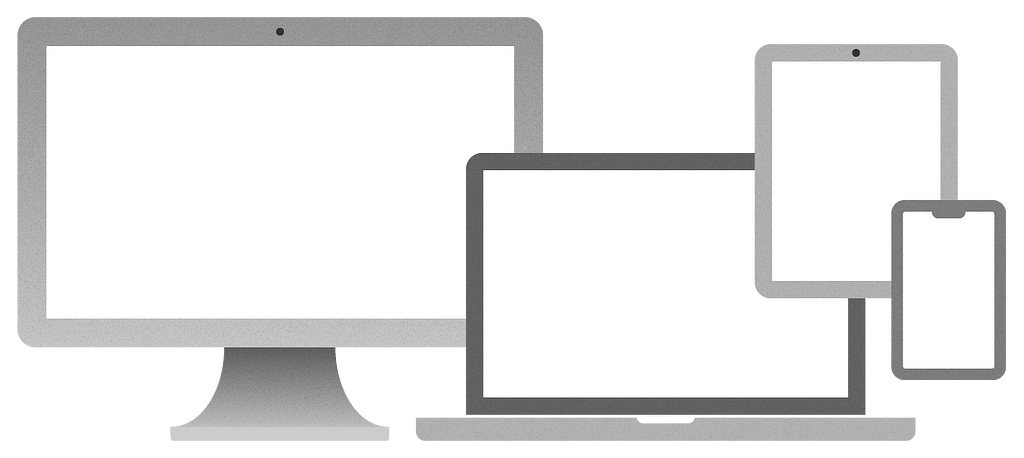 4 modern computing devices bunched up together, from left-to-right. A desktop PC, a laptop, a tablet, a smart phone.