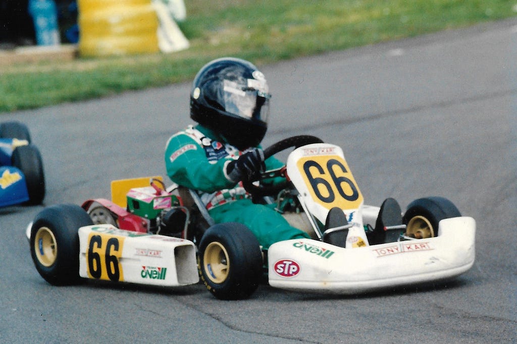 Image of the author racing a 50cc go-kart