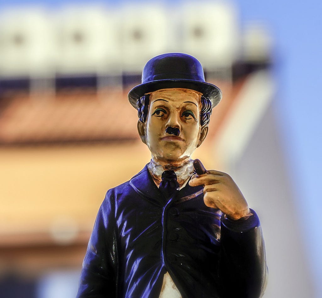 charlie chaplin figure in blue