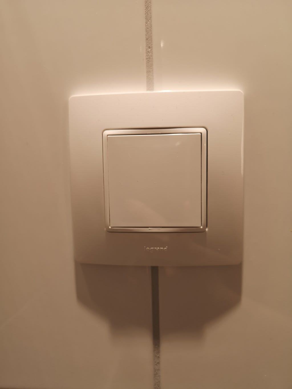 A fake power plug that existed in the bathroom and that I thought was where the hairdryer connected.