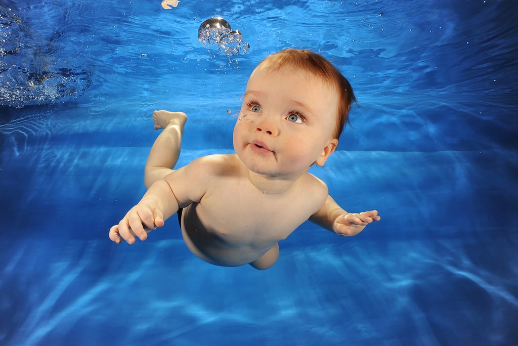 A human baby has a pre-disposition to swim. Picture: [news.softpedia.com](https://news.softpedia.com/news/Watch-Baby-Swimming-Across-Pool-Video-364680.shtml)