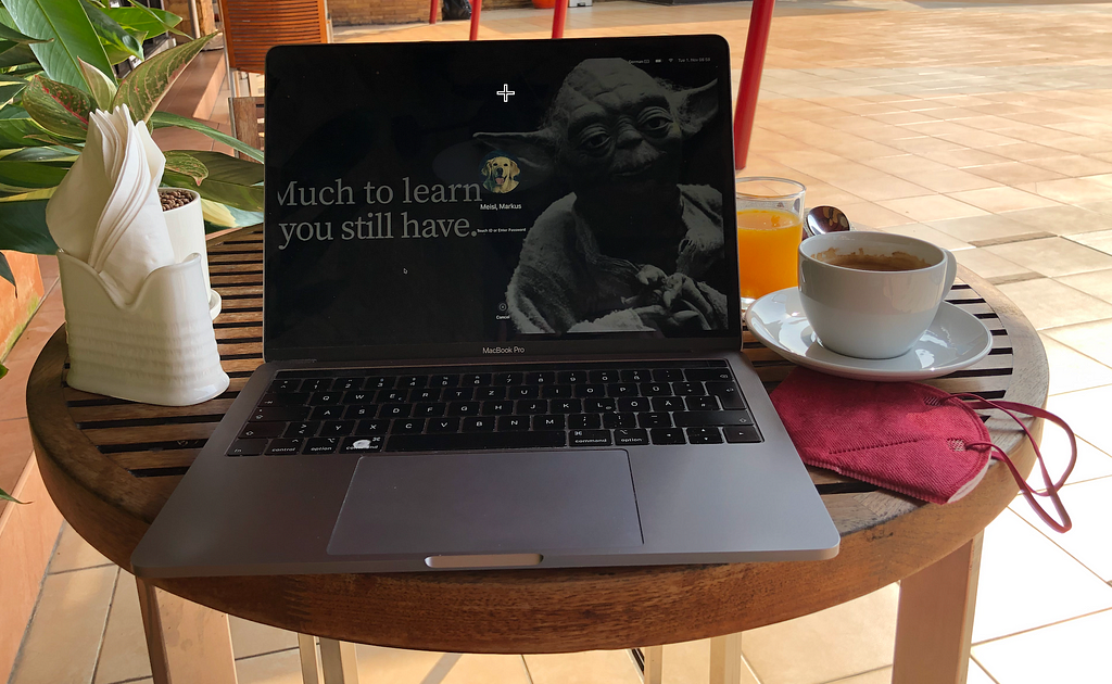 Photo of laptop and cup of coffee in the morning