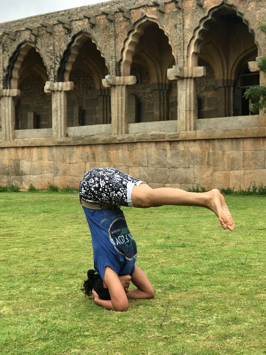 A picture of me in Hampi doing a variation headstand. Travel and yoga both make me happy.