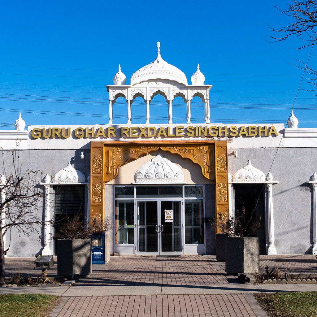 The facade of the Guru Char Rexdale Singh Sabha — Sikh Temple. The facade is a bronze and white design which became elements for my photo manipulation.