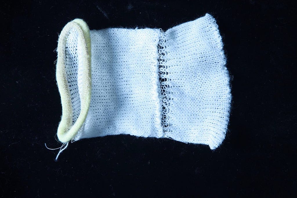 6. Processing, spun muka yarn through Wholegarment® knitting system.