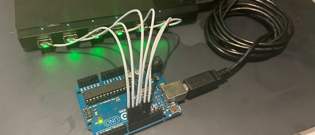 6 powered HyperFIDO keys connected to a USB hub and attached to a Arduino