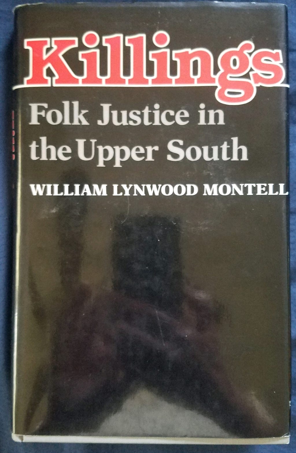 A photo of William Lynwood Montell’s book “Killings — Folk Justice in the Upper South.”