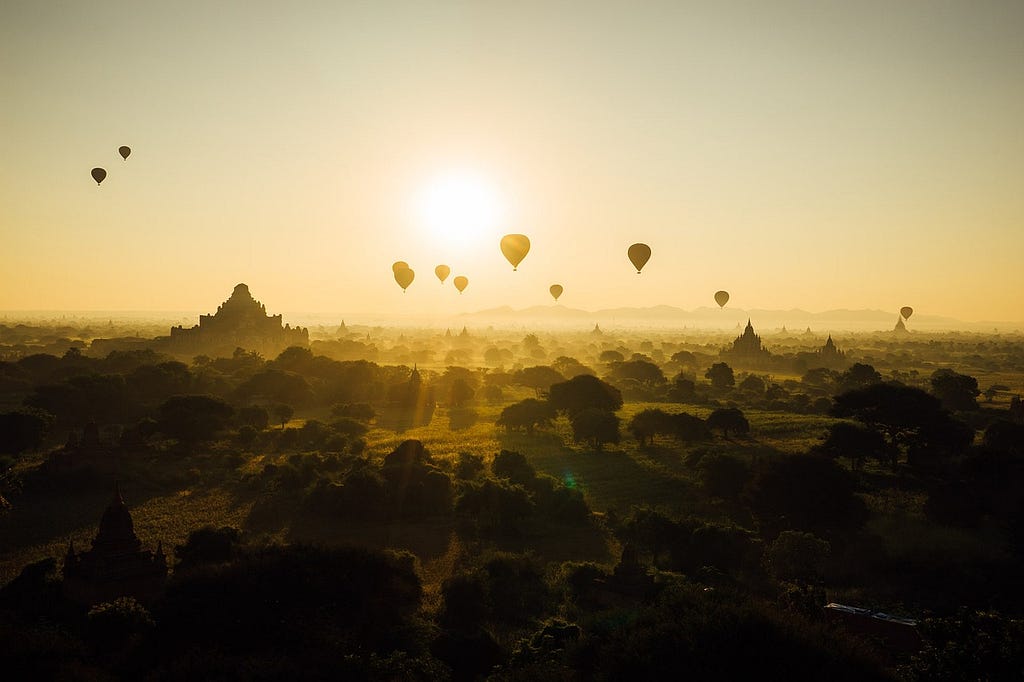 Sunny morning with some hot air ballons far away