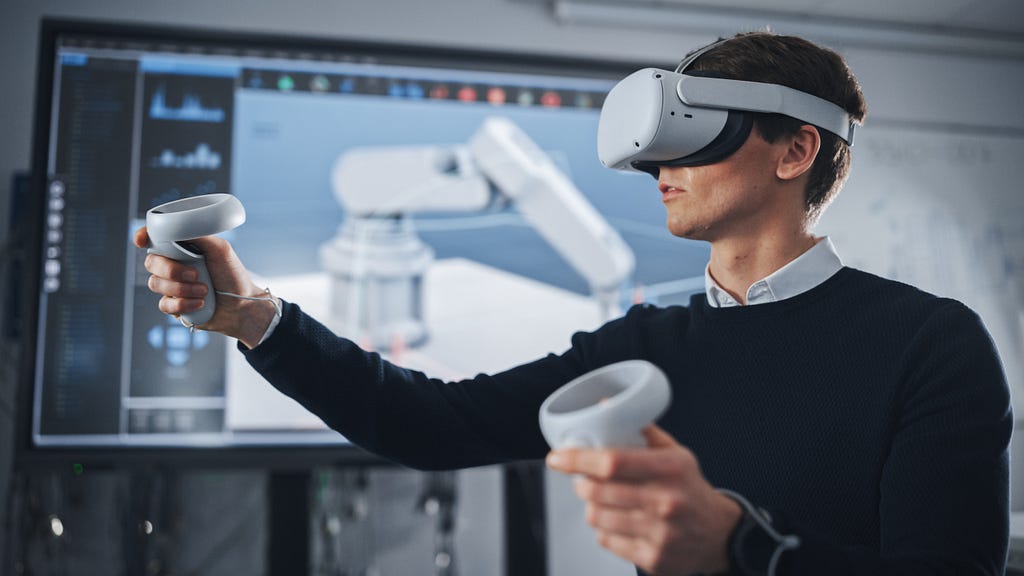 An industrial worker or an engineer working in machine models in VR.