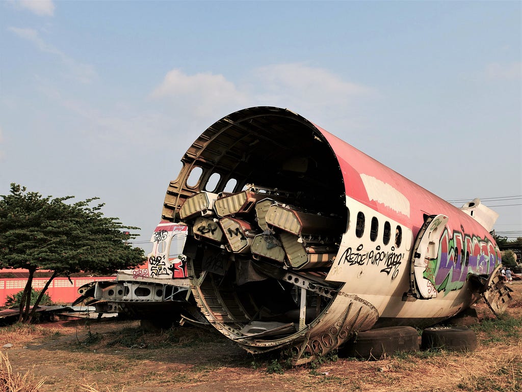 This airplane graveyard is a famous tourist spot in Bangkok. Credit — Stacey Tenenbaum