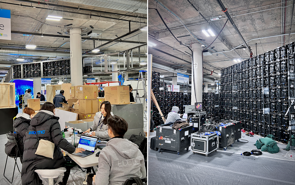 People working to prepare constructing booth for CES conventions in the hall