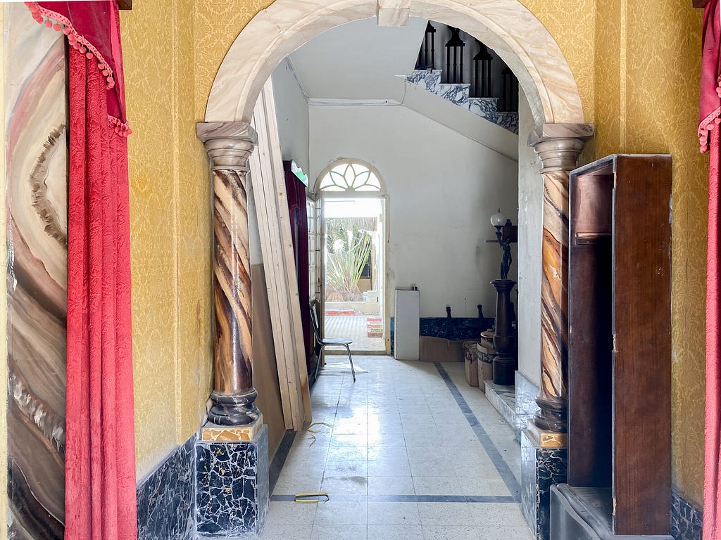 Flamboyantly decorated front hallway of this Kercem, Gozo townhouse.