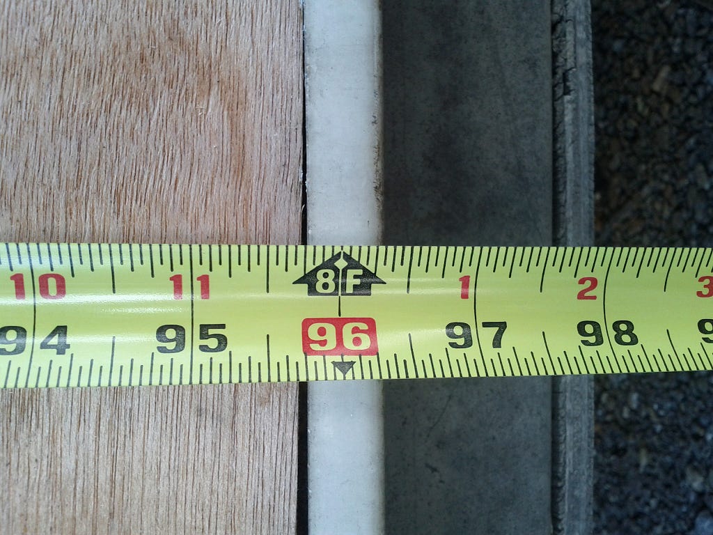 Tape measure at 8 ft. mark.