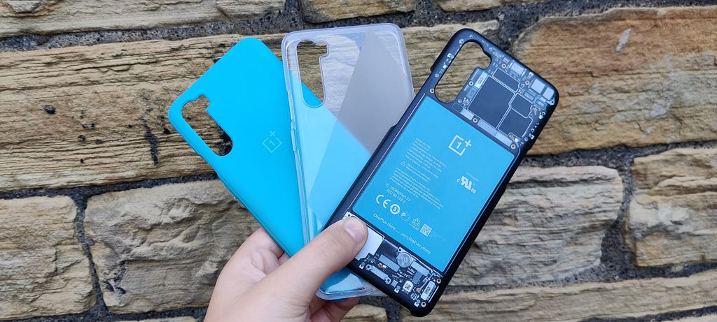 OnePlus Nord cases: blue sandstone, clear silicon and a Jerry Rig Everything creative case.