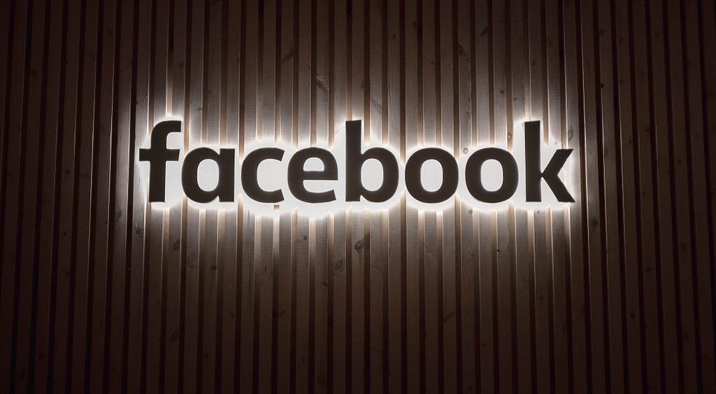 Facebook company logo and sign lighting up