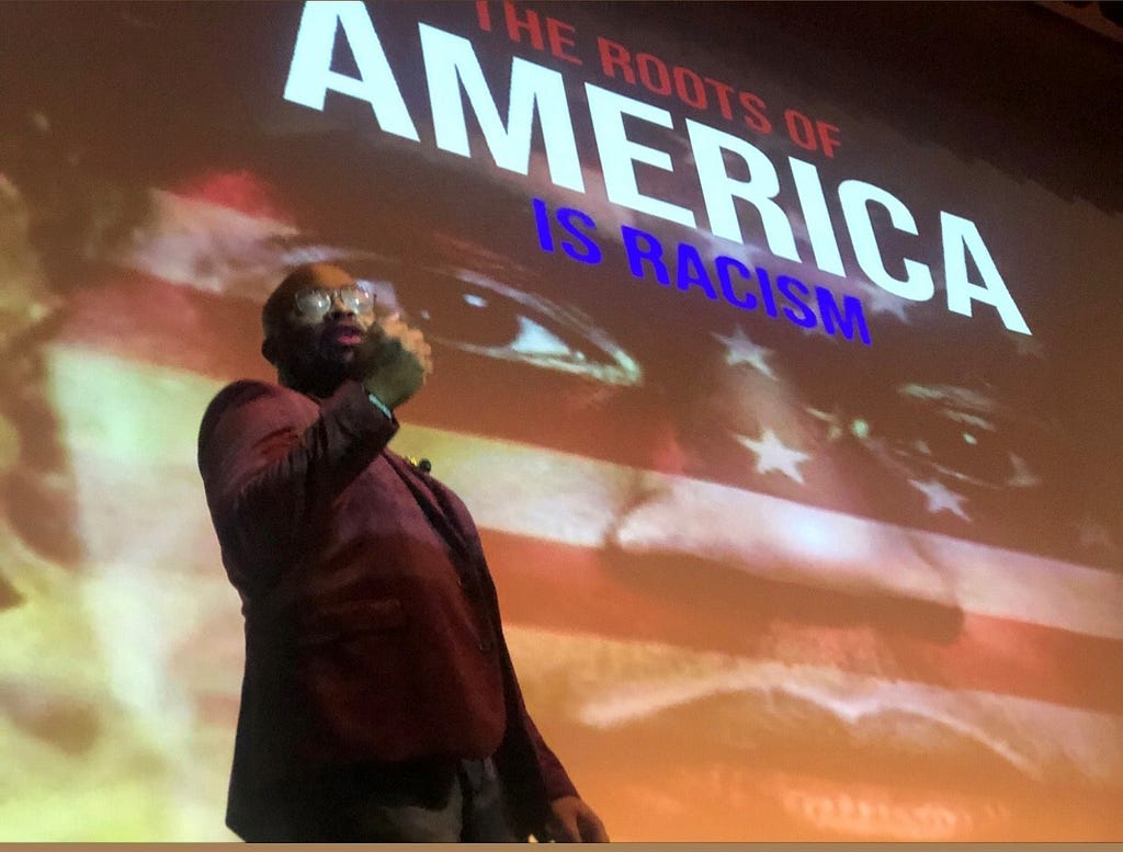 Dr. Engram giving a talk about racism and white supremacy at the University of Texas at Arlington