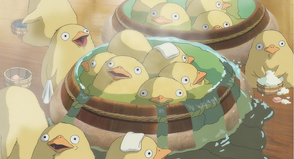 a group of ducks in a bath