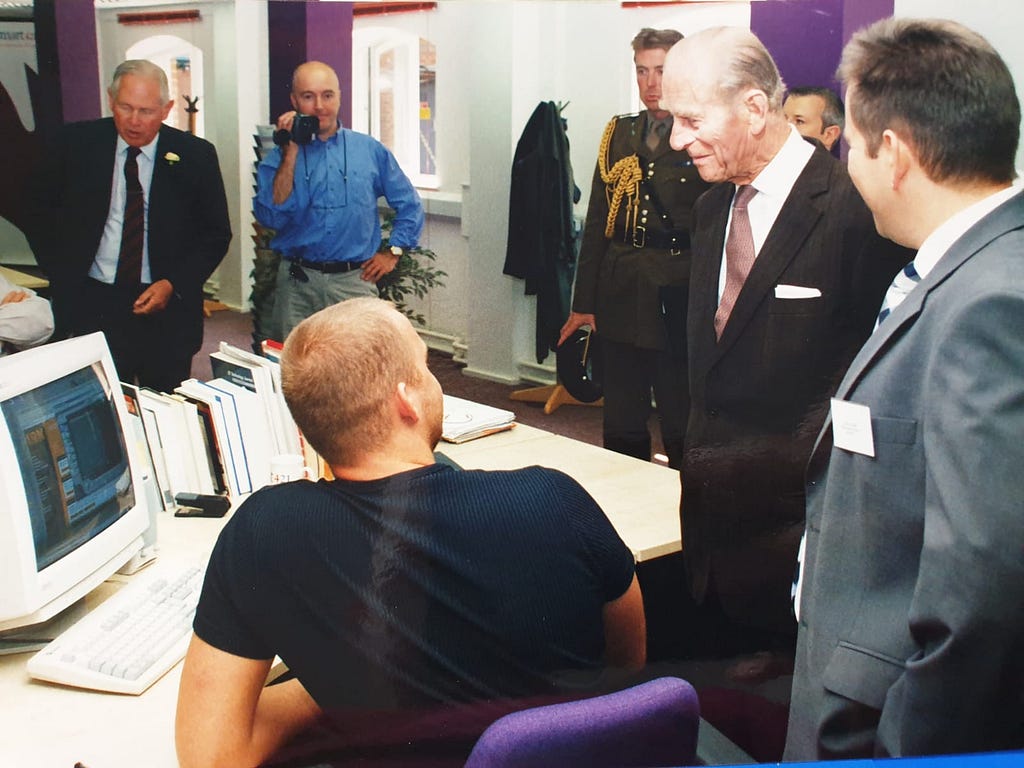 A young me, showing Prince Philip something he found funny — minimal design