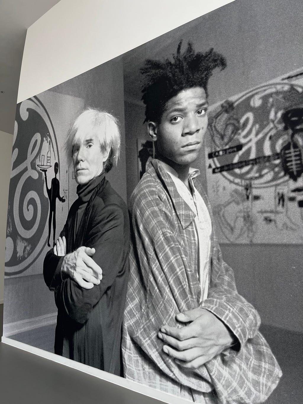 Andy Warhol and Jean Michel Basquiat side to side