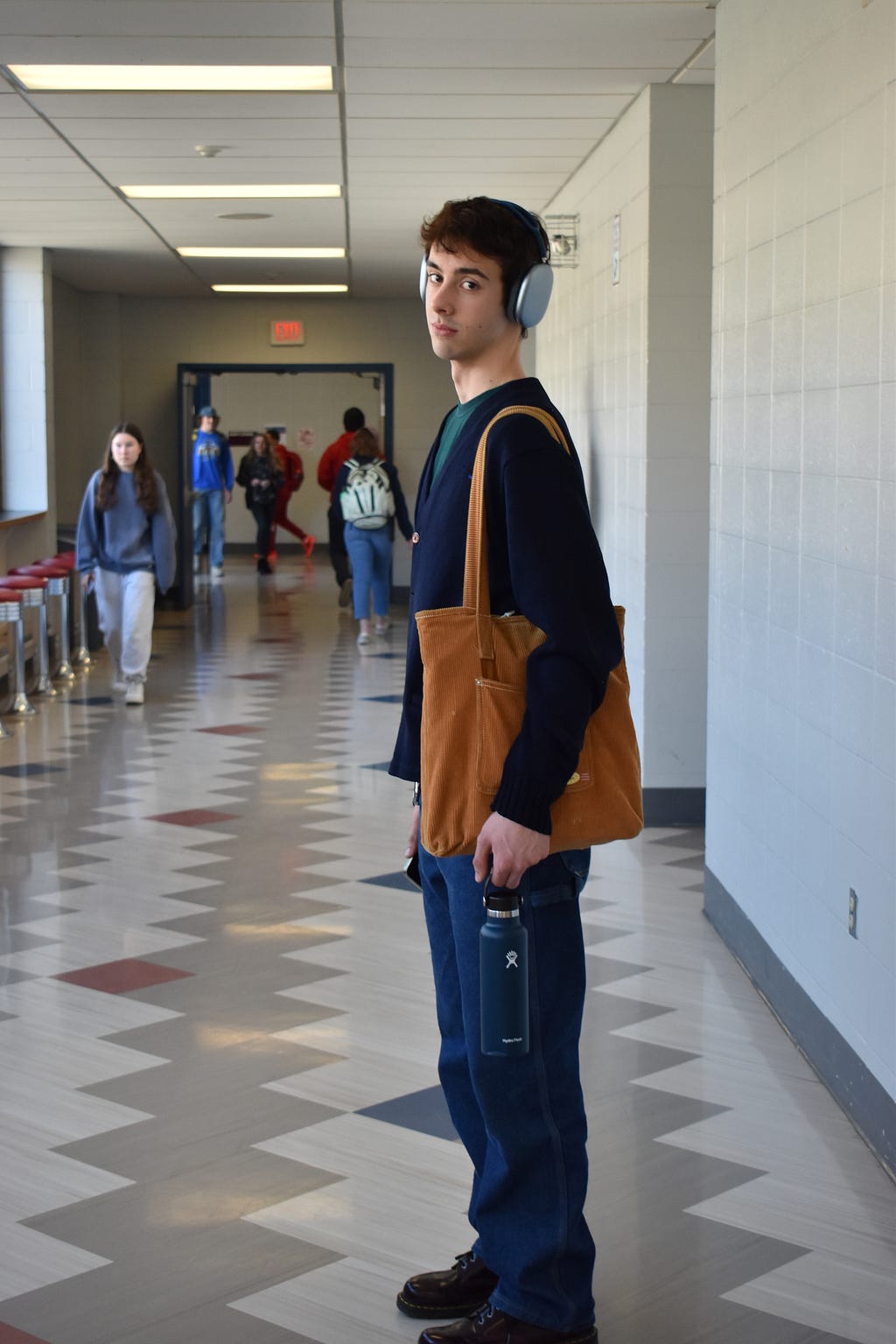 SKHS senior, Jake Serafin, posing in Mez Cafe