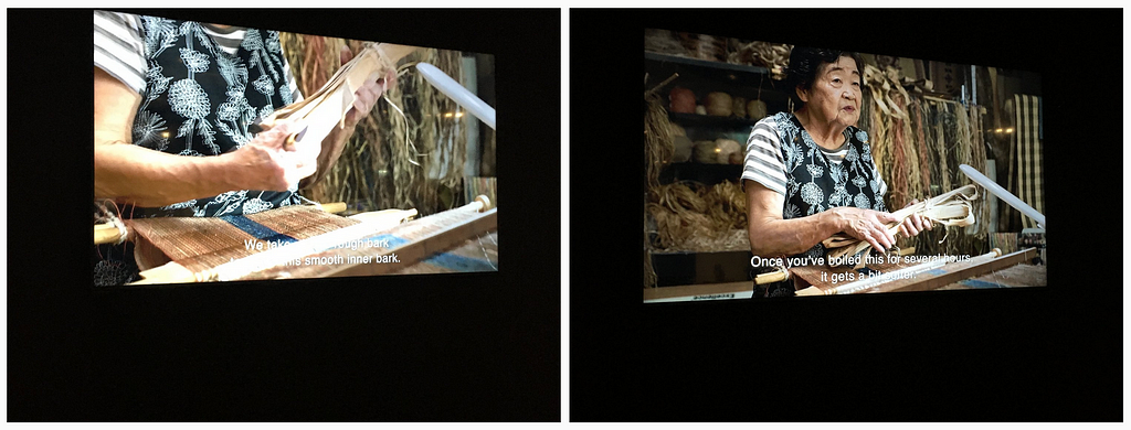 1–2. Video stills of attus weaver Kaizawa Yukiko explaining how to take the rough inner bark of a tree and process it so over time it becomes softer, before it can be stripped further for yarn.