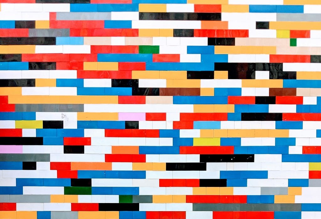 Lego brick wall with multiple coloured bricks