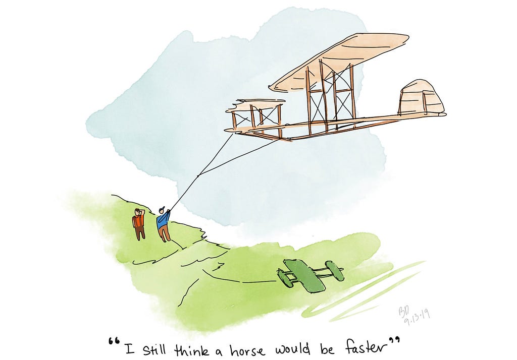 One of the Wright brothers flies a prototype-airplane kite while an onlooker tells him a horse would be faster.