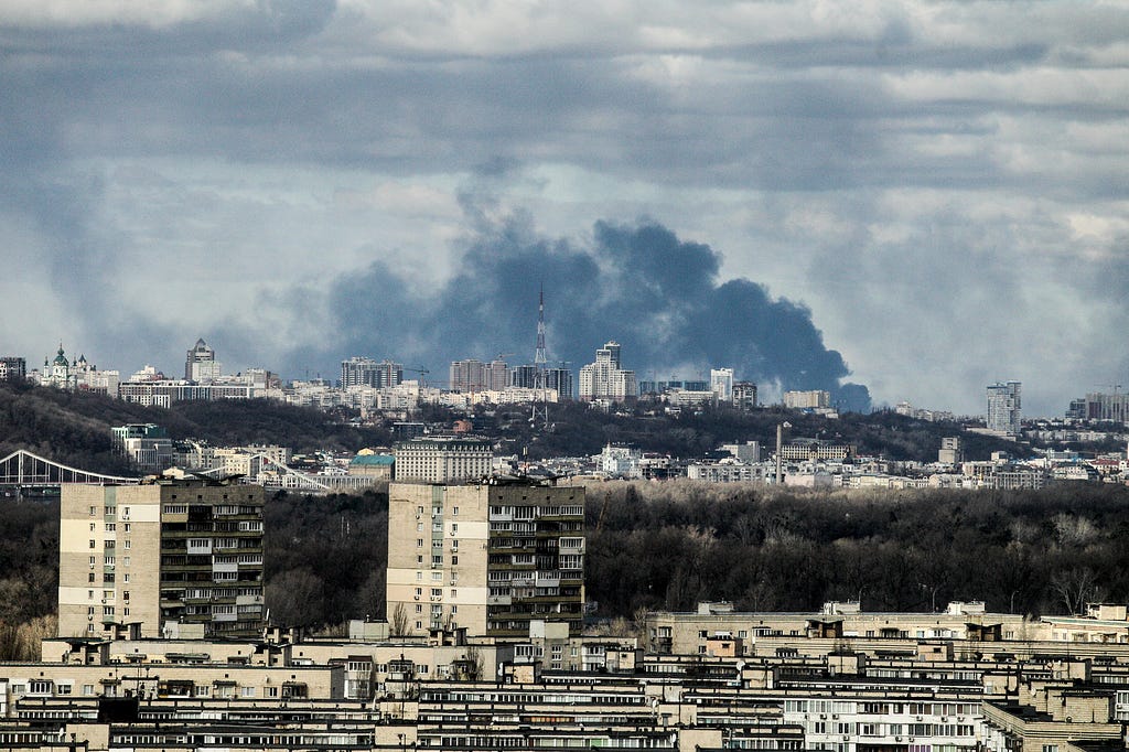 KYIV, UKRAINE — FEBRUARY 27, 2022 — Smoke rises over the part of Ukraine’s capital situated on the right bank of the Dnipro River in the morning on Sunday, Kyiv, capital of Ukraine.