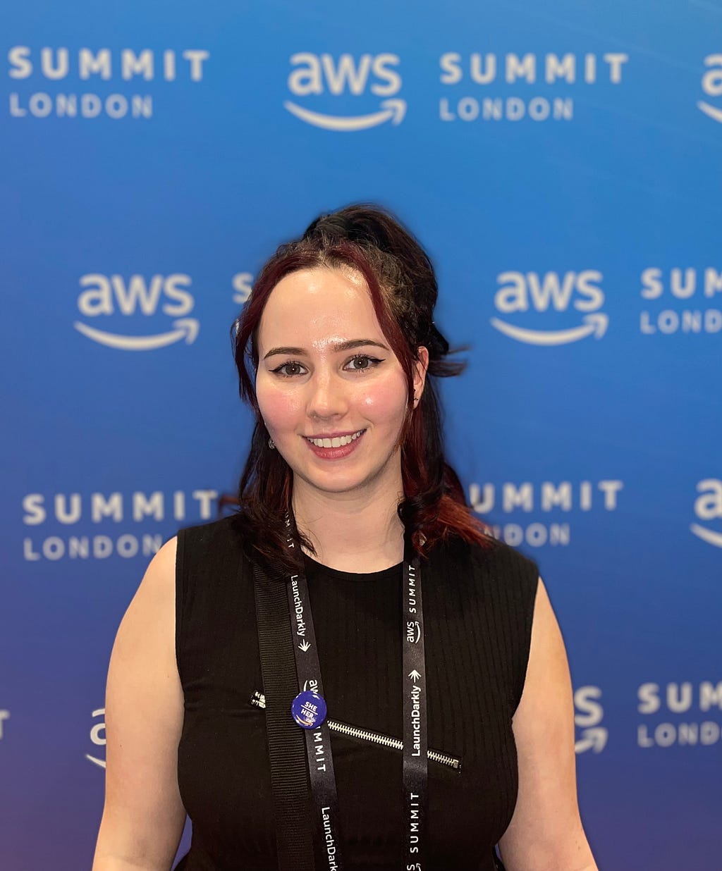 A photo of Orla Dunlop, DevOps graduate at the Department for Work and Pensions at AWS Summit in London.