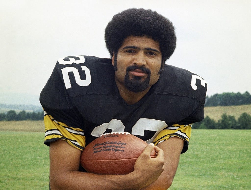 Franco Harris in 1973. Harry Cabluck / AP
