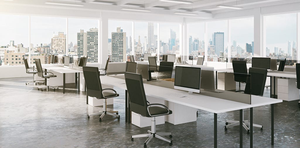 Covid-19 has made centralized systems (including offices) vulnerable. Image of an empty Manhattan office.