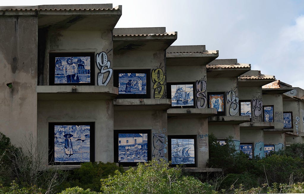 An abandoned hotel with decorated tiles