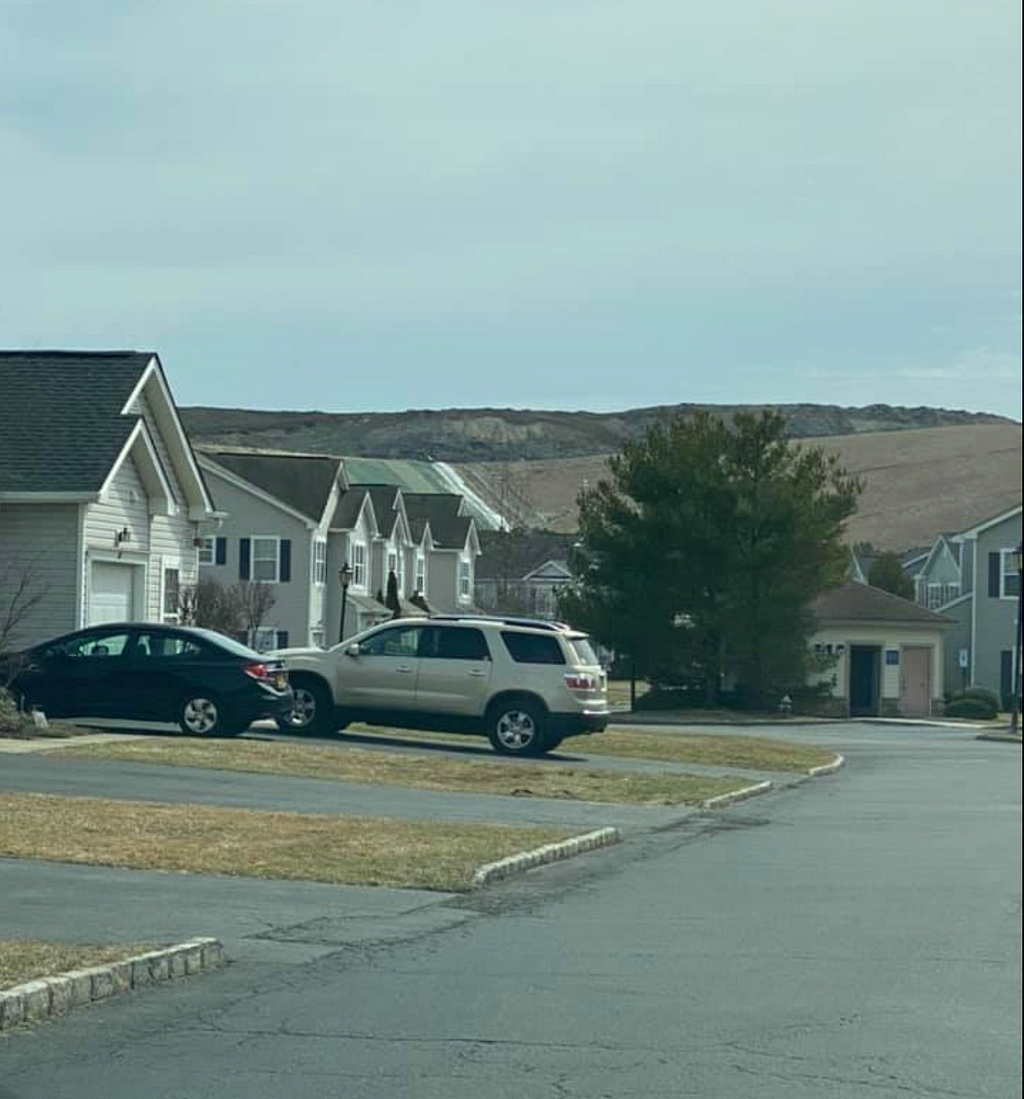 The Brookhaven Landfill as seen from a resident’s home in North Bellport. Kathryn Qureshi