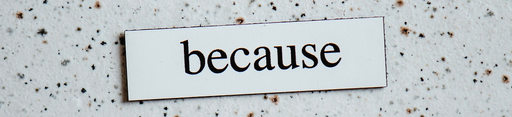 The word “because” written across a mottled background.