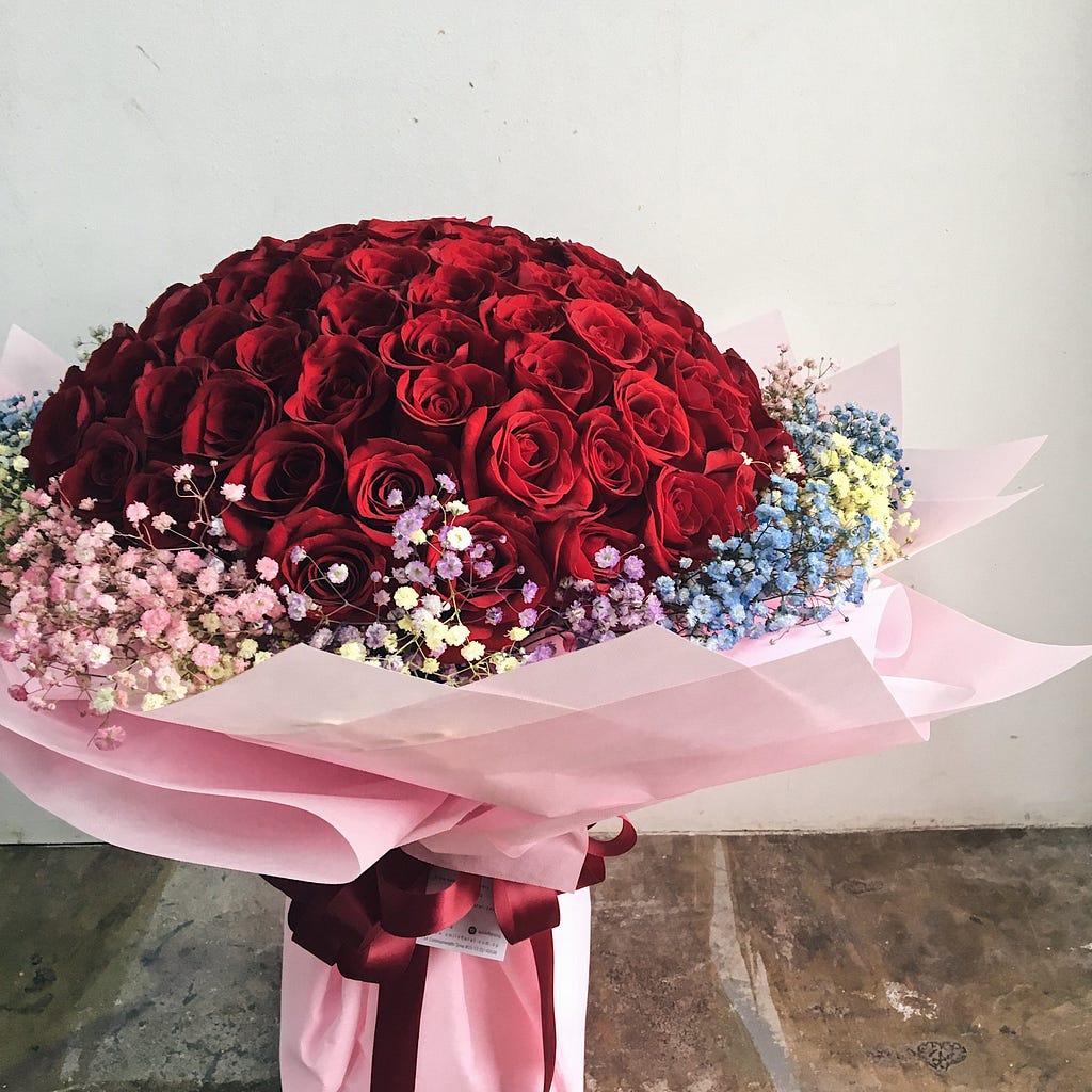 Red 99 roses bouquet with baby breath from Smile Floral