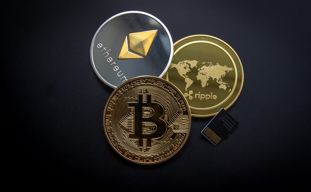Coins representing various cryptocurrencies